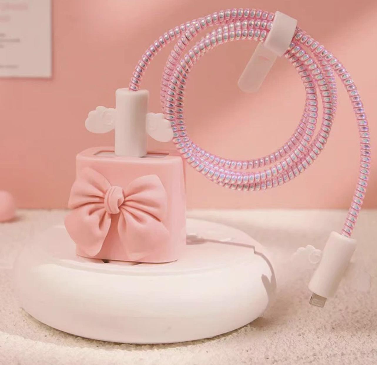 PINK BOW CHARGER CASE. GRIP GADGETS