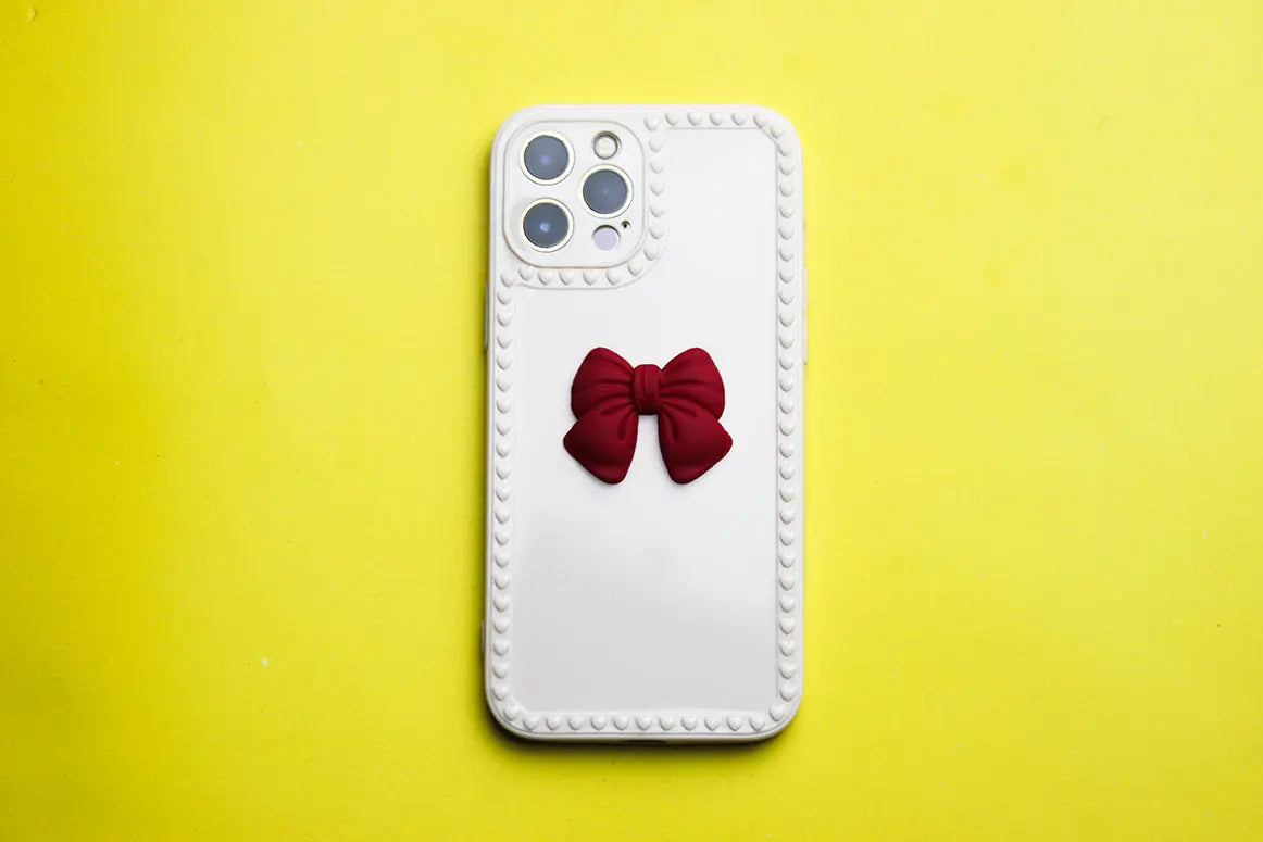 RED BOW DESIGN PHONE CASE. - grip