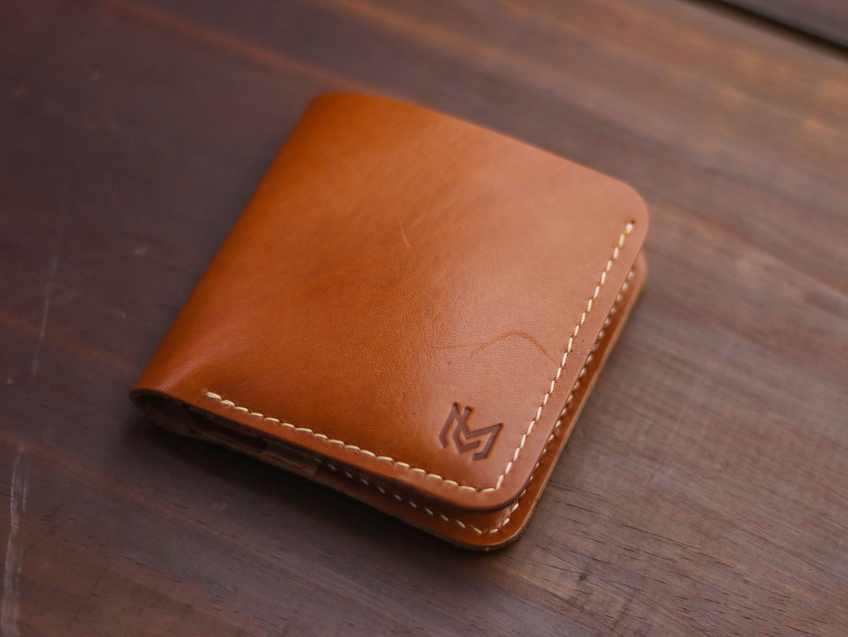 "TRIDENT" TAN BROWN AND NATURAL BUTTERO