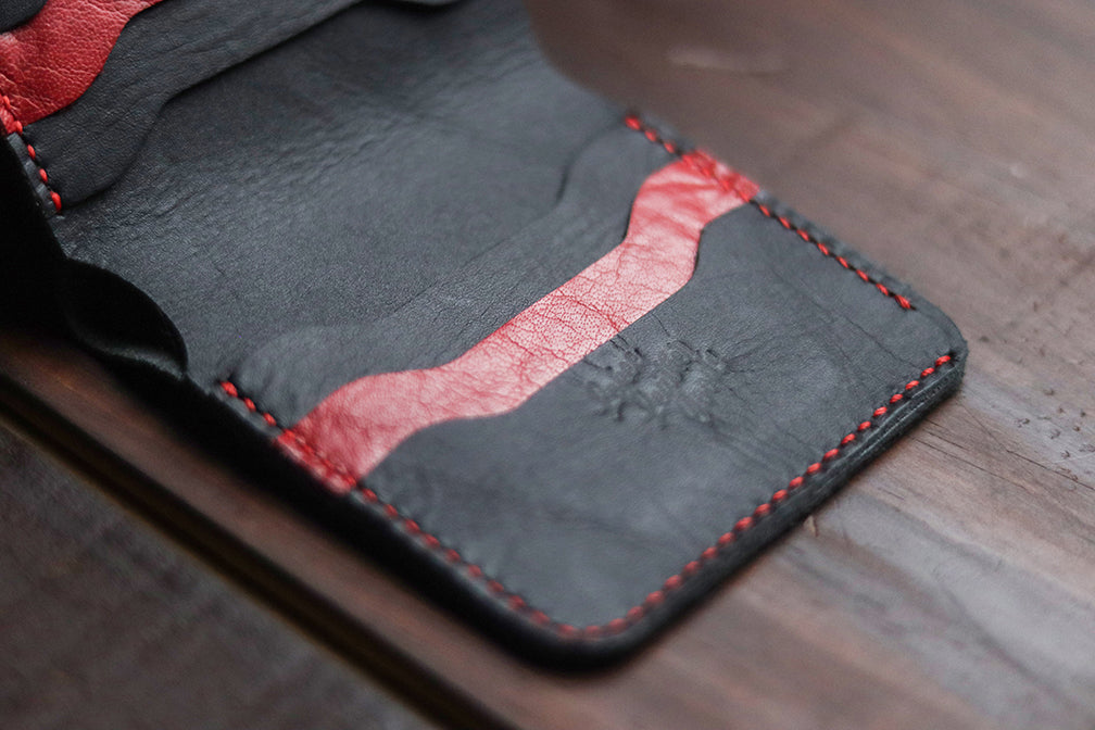 "TRIDENT" BALCK & RED.