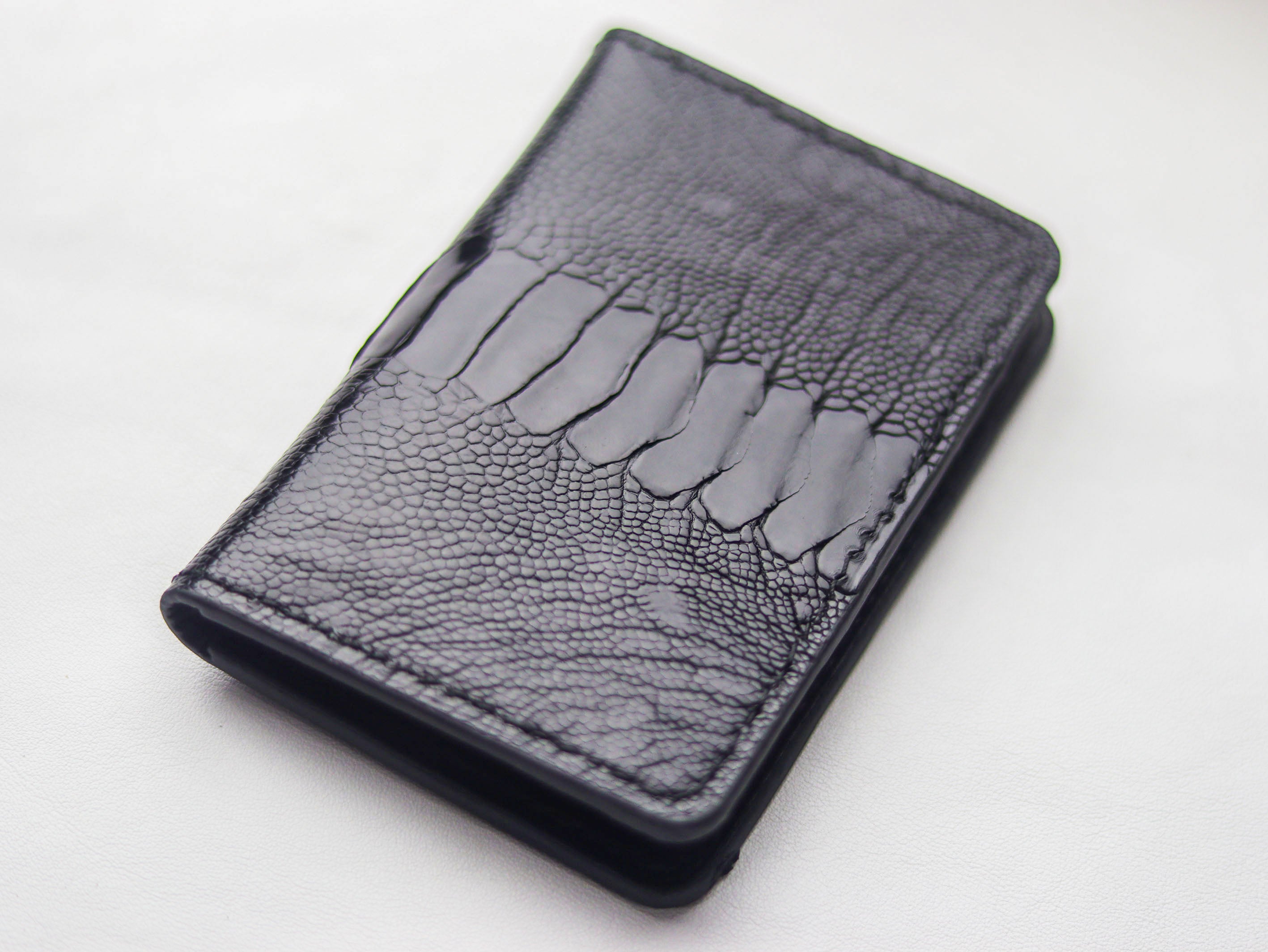 ARTEMUS - BIFOLD CARD WALLET RAVEN BLACK OSTRICH LEG SKIN