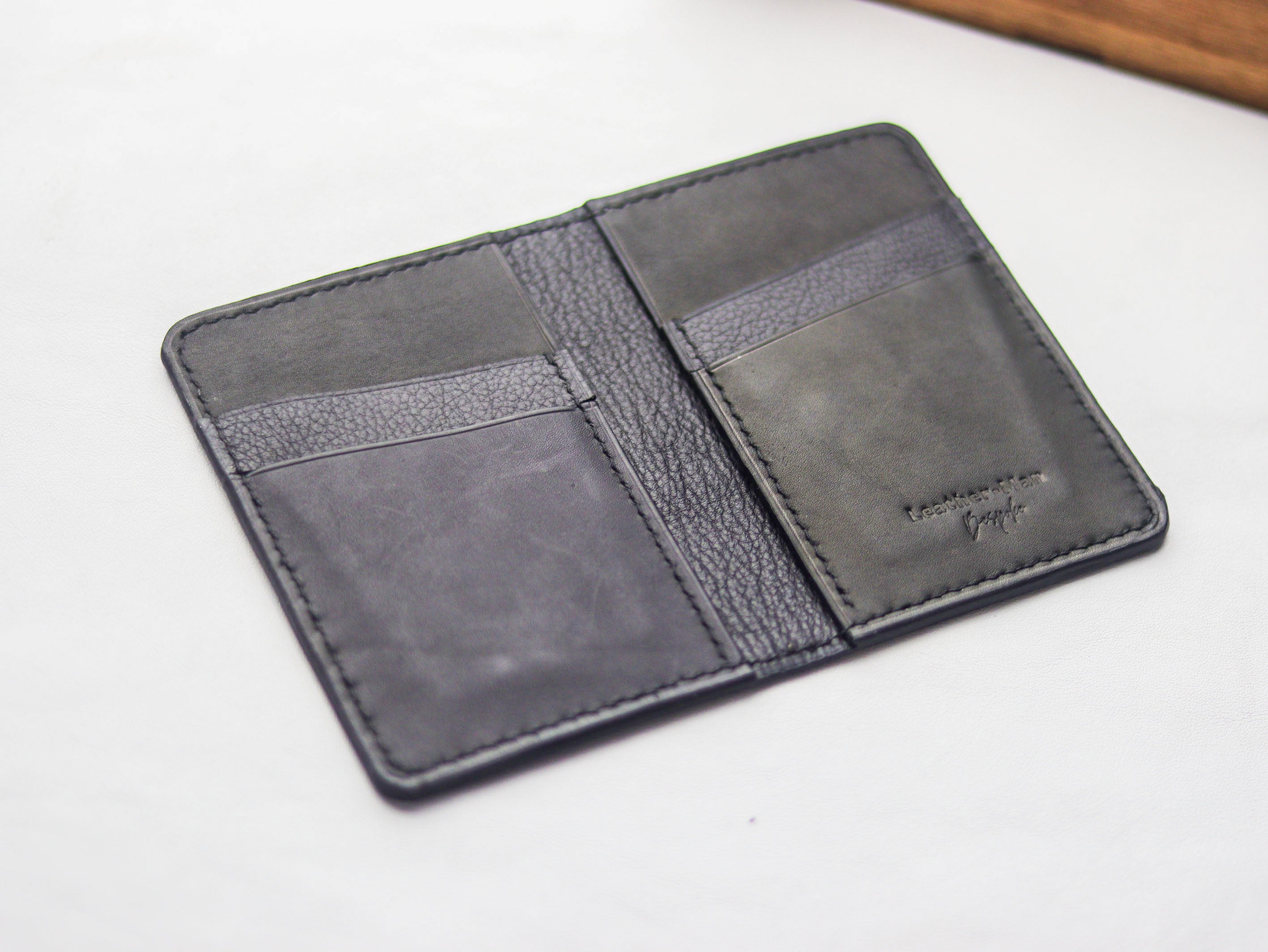 ARTEMUS - BIFOLD CARD WALLET RAVEN BLACK OSTRICH LEG SKIN